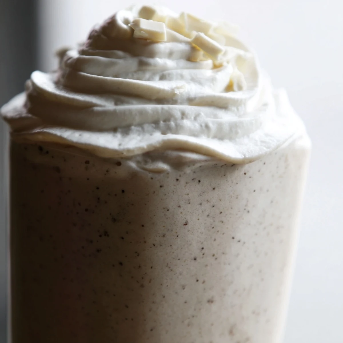 This creamy blended beverage features real vanilla bean seeds for a rich, aromatic flavor profile.