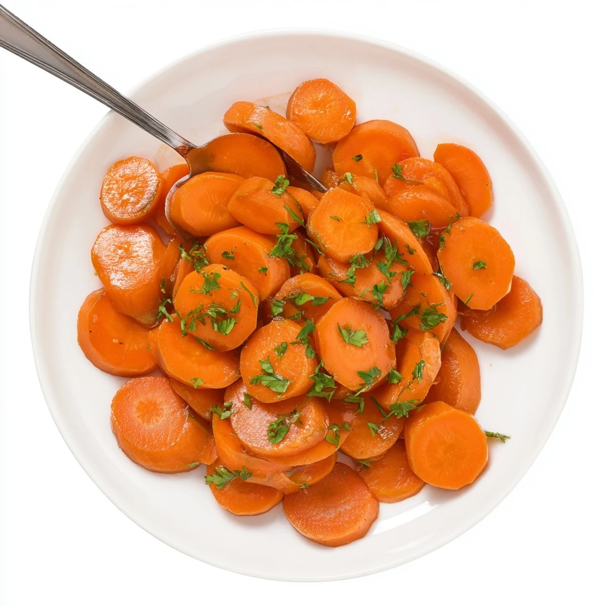 Savory sweet brown sugar glazed carrots sprinkled with fresh parsley garnish for Thanksgiving dinner