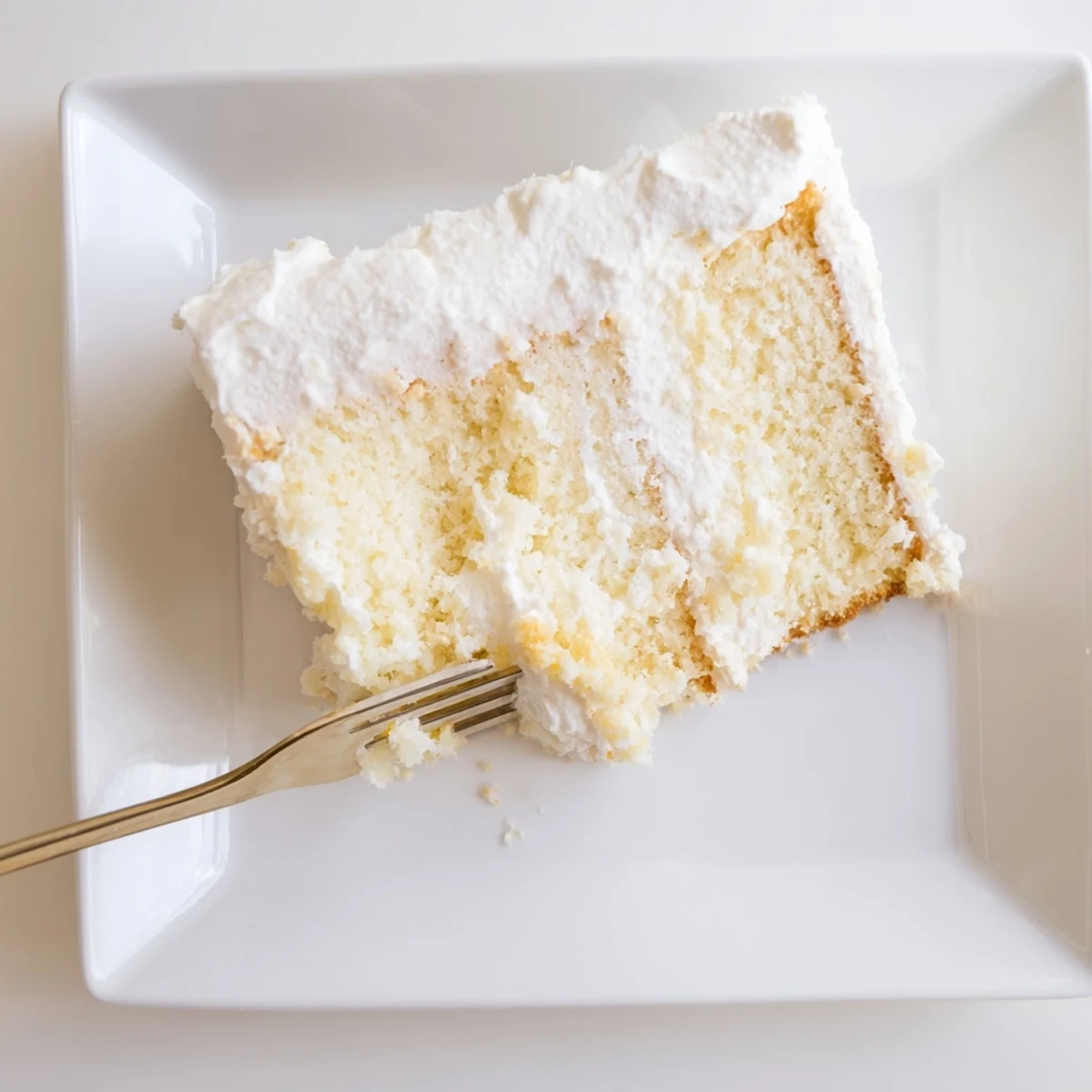 Light and tender church cake with buttery frosting perfect for potluck celebrations