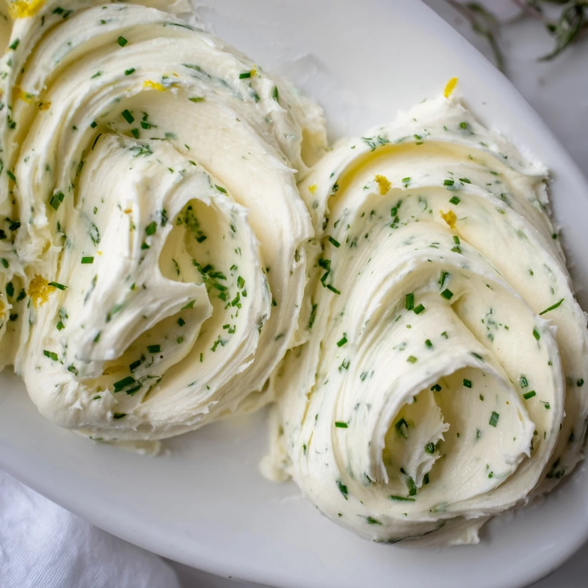 Guests spreading Rustic Creamy Herb Infused Butter Board on warm baguette slices