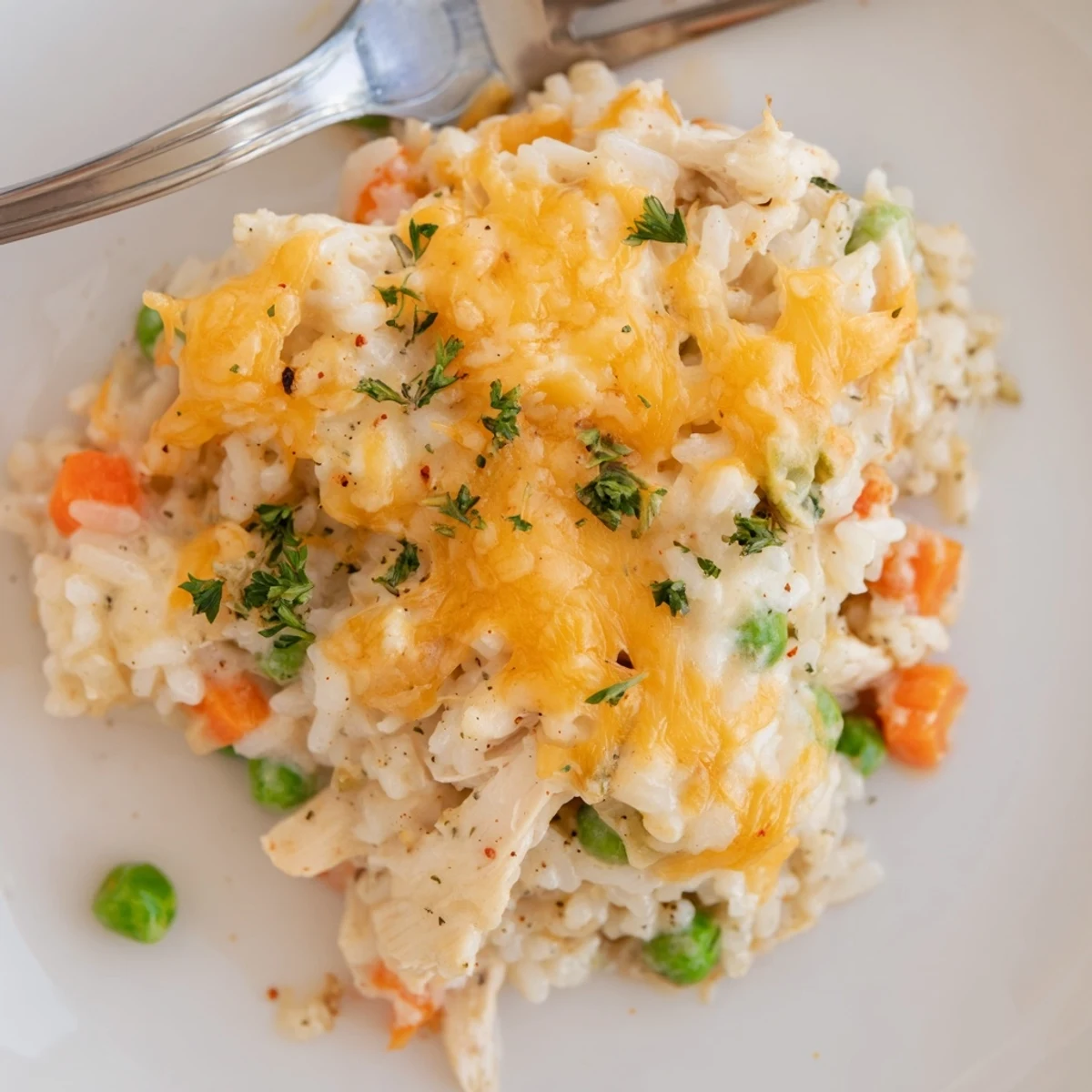 Skillet-to-oven aroma wafts from Creamy Chicken And Rice Casserole Bake With Cheese Delight