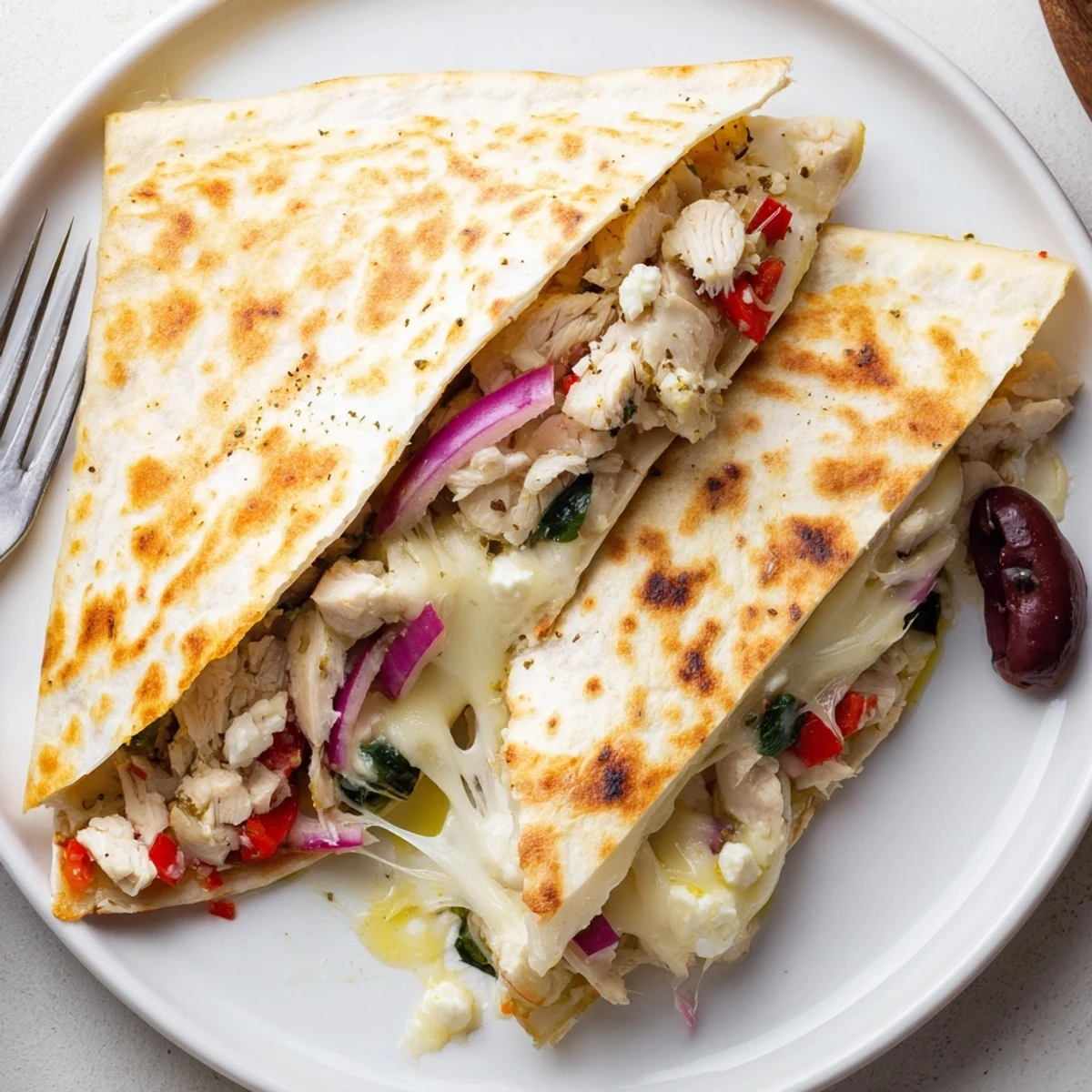Greek Chicken Quesadillas With Melty Cheese For Dinner Delight, golden crisp tortilla wedges