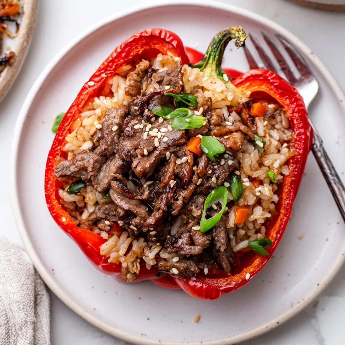 Korean Beef Bulgogi Stuffed Bell Peppers With Rice Delight, steaming, sesame-sprinkled and ready