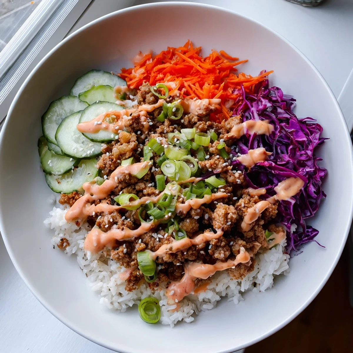 Ground Turkey Rice Bowls With Bang Bang Sauce served in a white ceramic dish